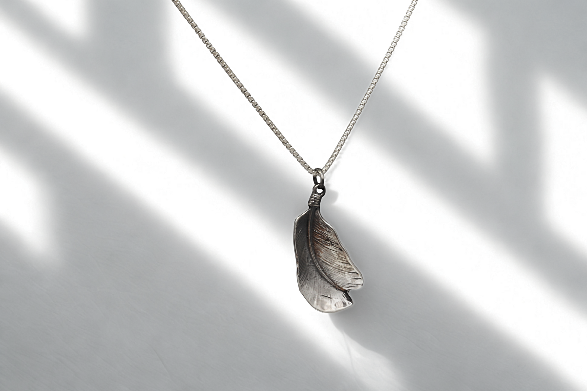 תליון Feather Spirit