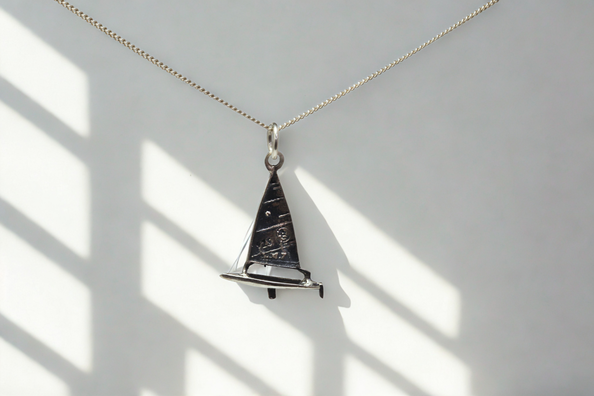 תליון LASER 4.7