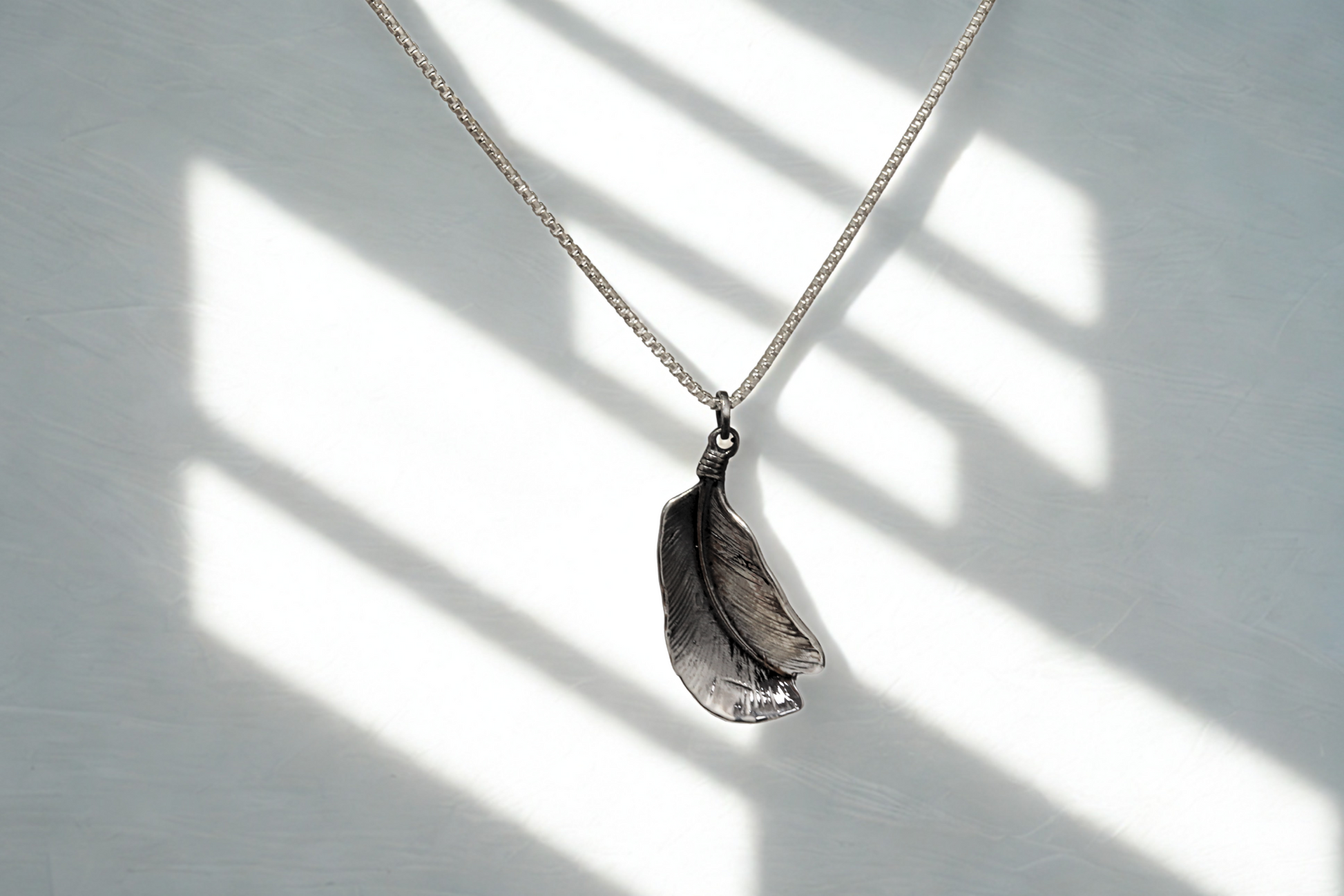 תליון Feather Spirit