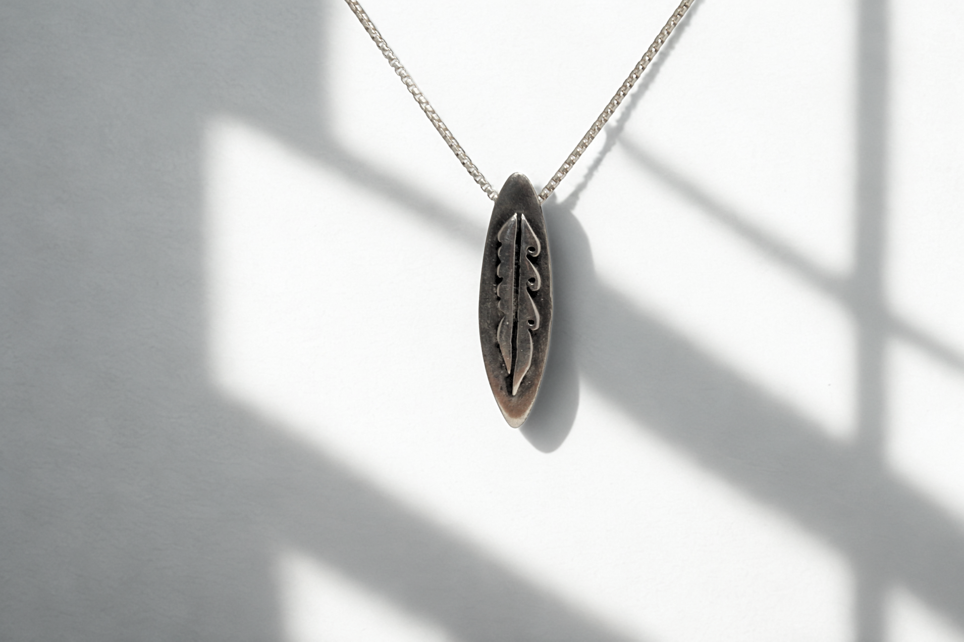 תליון גלשן Surf Leaf