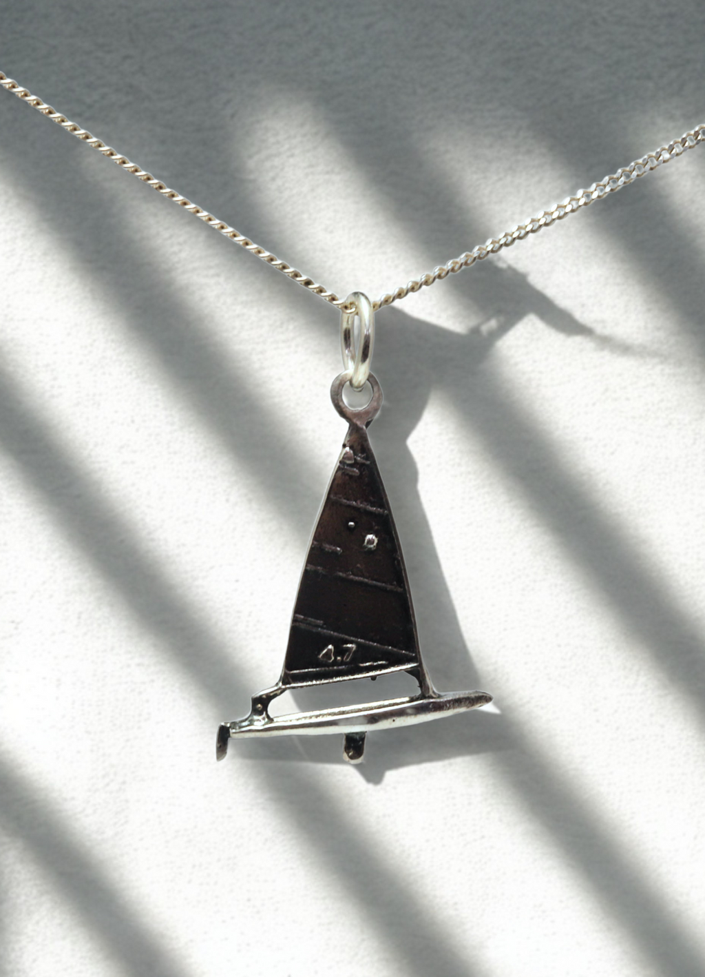 תליון LASER 4.7