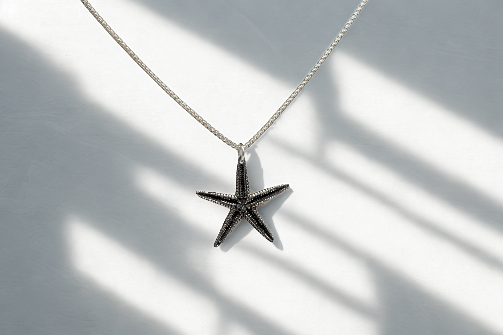 תליון כוכב ים בהעתק מדויק למקור